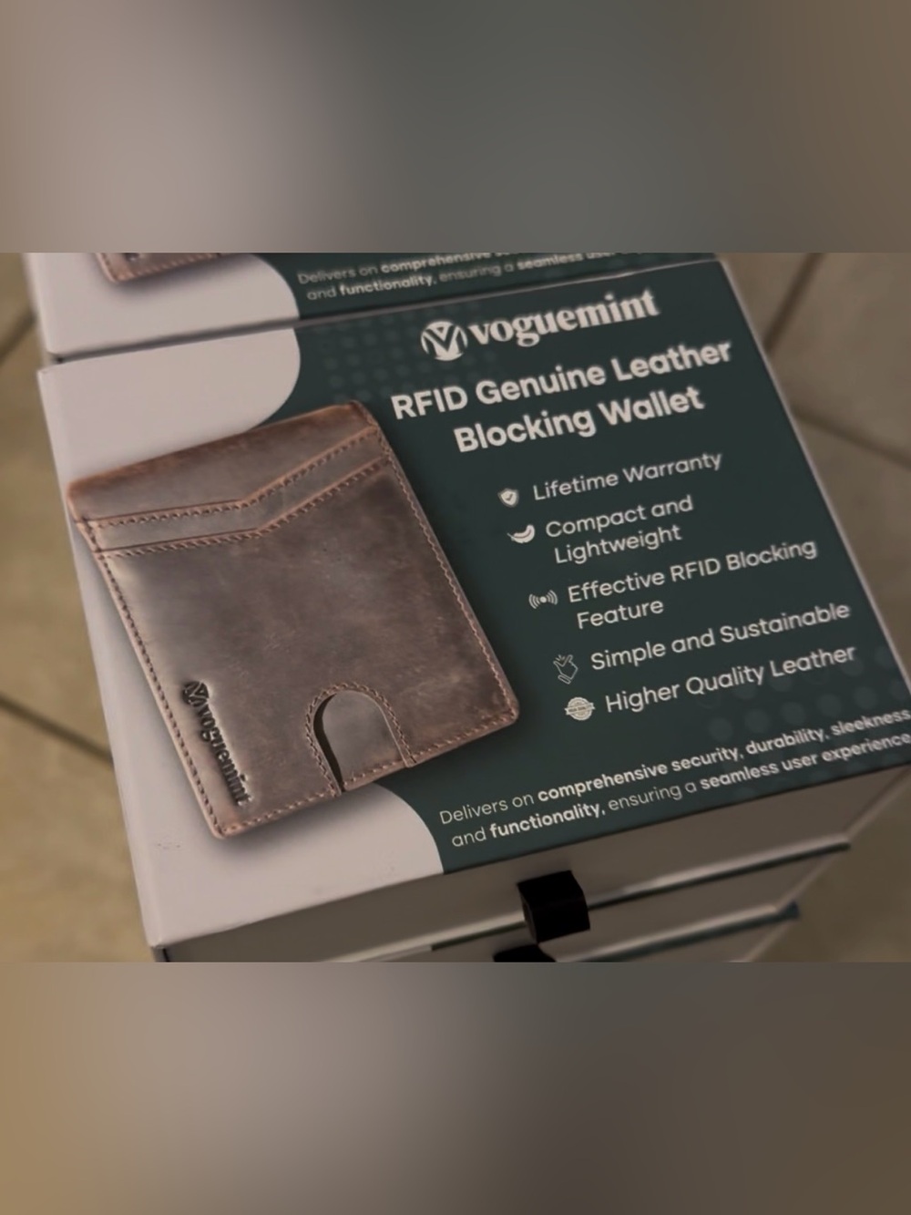 165 new boxes of Voguemint RFID Genuine Leather Blocking Wallet. Black/brown